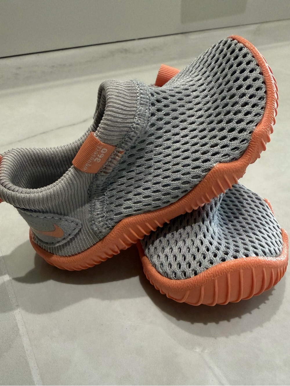Nike Kids Grey Mesh Slip-On Sneakers with Coral Accents